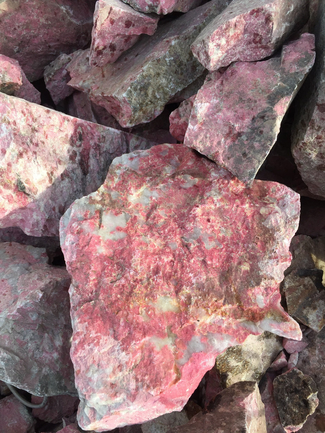 Thulite from Norway 10 pounds Roughstone.Rocks LLC